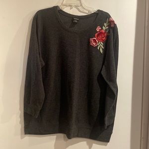 TORRID GREY SWEATER WITH ROSE EMBELLISHMENT ON SHOULDER IN SIZE 2